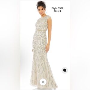 Embellished illusion cap sleeve long gown